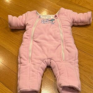 Baby Merlin’s magic pink sleepsuit size small (3-6 months) .